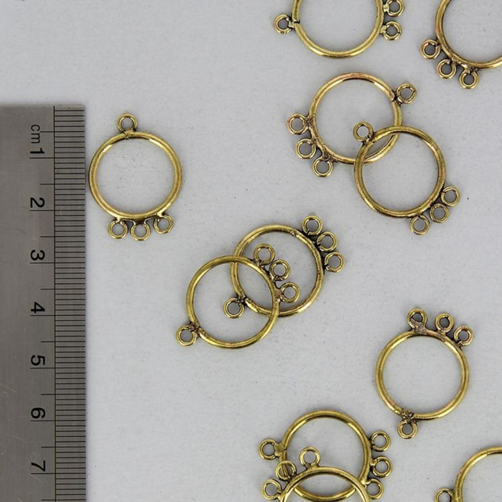 Breloque en métal ronde 4 anneaux laiton vieilli - 17 x 25 mm - Topaze - Rougier et Plé